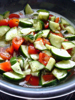 A picture of Cucumber and Tomato Salad.