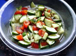A picture of Cucumber and Tomato Salad.
