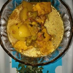 A picture of Potato and peas and paneer veg.