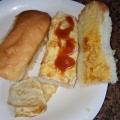A picture of Hot dog roll and fried egg #charity support recipe.