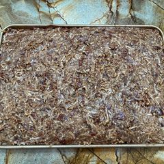 A picture of German chocolate Texas sheet cake.