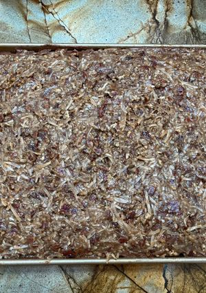A picture of German chocolate Texas sheet cake.