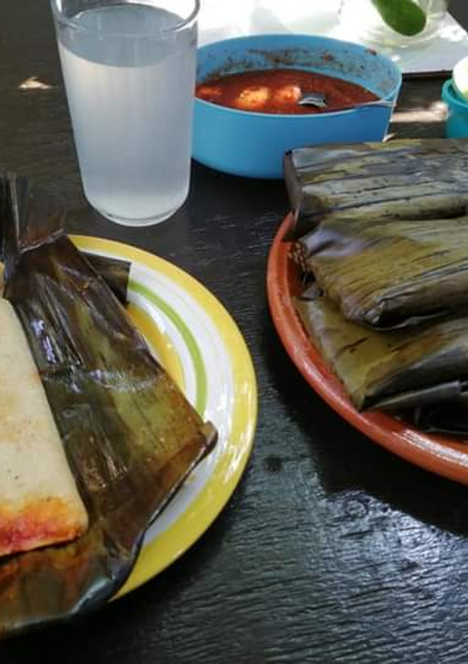 Una foto de Tamales de puerco en hoja de plátano