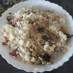 A picture of Veg biriyini with rice cooker.