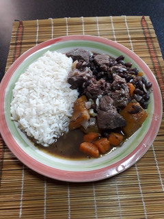 Una foto de Porotos o frijoles con arroz