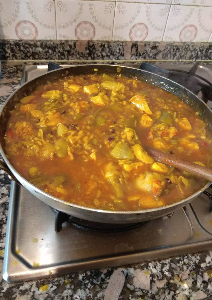 Una foto de Arroz caldoso con pollo