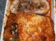 Una foto de lomo de cerdo relleno de jamón y queso