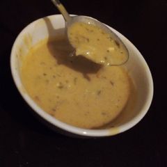 A picture of Creamy curry noodle soup, extra hot.