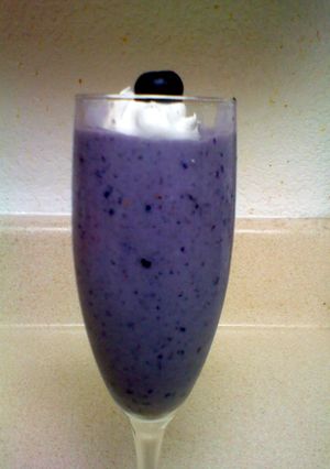 A picture of blue and blackberry smoothie.
