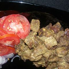 A picture of Grilled beef,Kenyan greens & white rice.