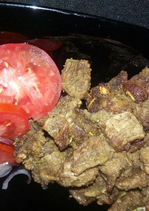 A picture of Grilled beef,Kenyan greens & white rice.