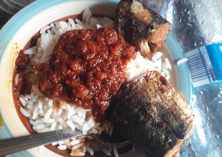 Rice stew and fried fish