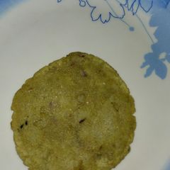 A picture of Jowar green peas puri.