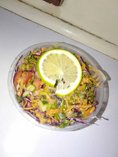 A picture of Red cabbage and capsicum salad.