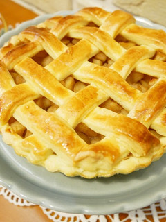 A picture of Warm Apple Pie with Plenty of Filling and Irresistible Cinnamon Aroma.