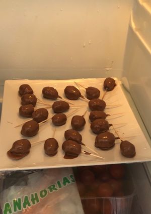 A picture of Fruits in chocolate.