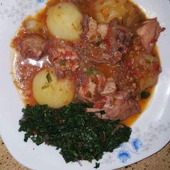 A picture of Meat stew with potatoes.