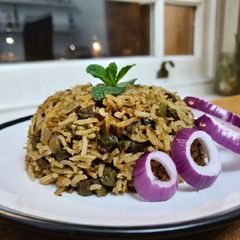 A picture of Hara Choliya Pulao (Green gram rice).