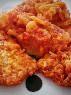 Una foto de Bacalao con tomate y patatas