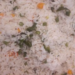 A picture of White rice with veggies.