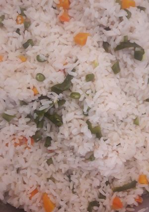 A picture of White rice with veggies.