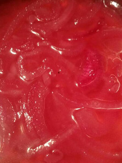 A picture of Quick Pickled Red Onions.