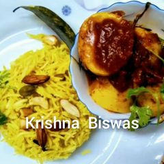 A picture of Bengali Style Sweet Basanti Pulao with Alor Dum.