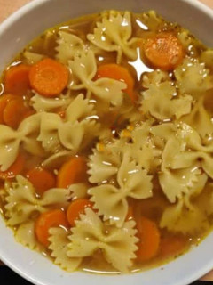 A picture of Bow-Tie Carrot Chicken Noodle Soup.
