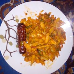 A picture of Chips masala and sausage...