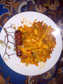 A picture of Chips masala and sausage...