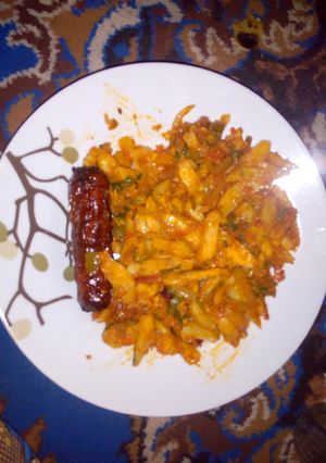 A picture of Chips masala and sausage...