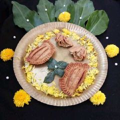 A picture of Wheat Flour Jaggery Gujiyas.