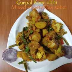 A picture of Mixed vegetables sabzi- 2 🍅🥔🫑🧅🧄.