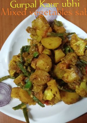 A picture of Mixed vegetables sabzi- 2 🍅🥔🫑🧅🧄.