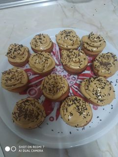 Una foto de Cupcakes con crema de café