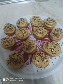 Una foto de Cupcakes con crema de café