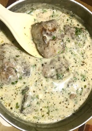 A picture of Pan grilled Basa in creamy herbed sauce.