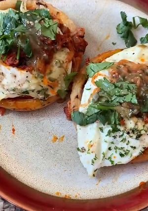 A picture of Breakfast chorizo sopes.