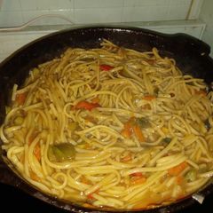 A picture of Lo Mein Noodles with veggies.