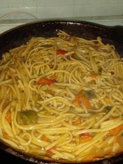 A picture of Lo Mein Noodles with veggies.
