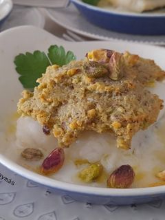 Una foto de Bacalao con pistachos