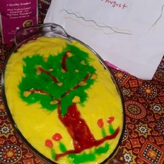 A picture of Mango custard cake with green mango tree.