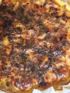 Una foto de Quiche de pollo, cebolla y queso