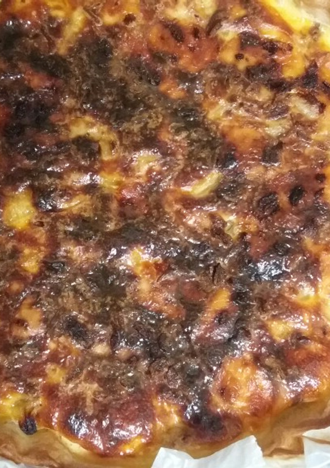 Una foto de Quiche de pollo, cebolla y queso