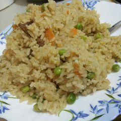 A picture of Fried rice with beef.