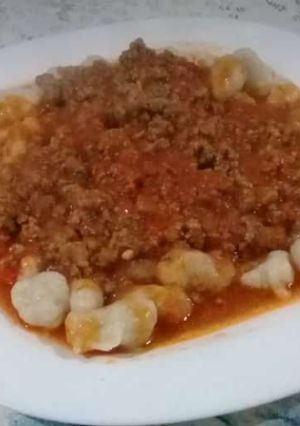 Una foto de Ñoquis caseros con boloñesa