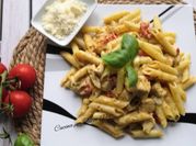 A picture of pasta tomatoes basil
