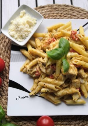 A picture of Chicken Pesto Pasta with Mozzarella.