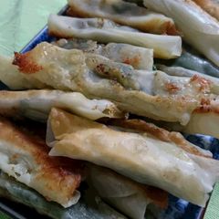 A picture of Rolled Gyoza with Cheese.