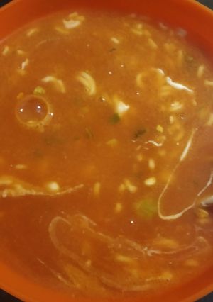 A picture of Chicken with tomato puree soup.